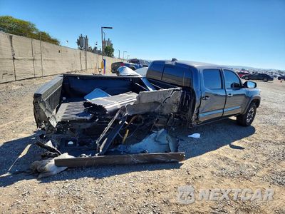 Trzecie zdjęcie samochodu z tyłu: 2023 TOYOTA TACOMA TRD OFF-ROAD VIN:3TMDZ5BN3PM163519 - miniatura