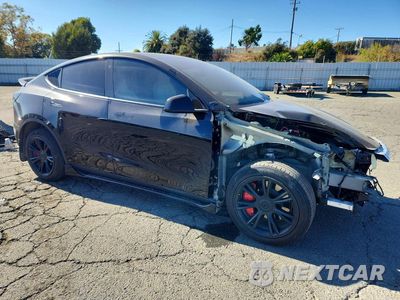 Czwarte zdjęcie samochodu z boku: 2023 TESLA MODEL Y VIN:7SAYGDEE9PF636117 - miniatura