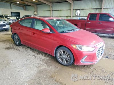 Czwarte zdjęcie samochodu z boku: 2018 HYUNDAI ELANTRA VALUE EDITION VIN:5NPD84LF6JH227148 - miniatura