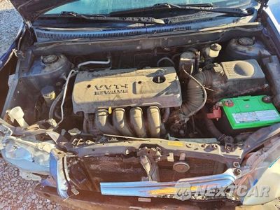 Zdjęcie 11 z 12 samochodu: 2003 TOYOTA COROLLA LE VIN:JTDBR32E530003991 - miniatura