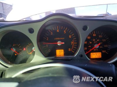 Zdjęcie 9 z 12 samochodu: 2004 NISSAN 350Z BASE VIN:JN1AZ34E14T064086 - miniatura