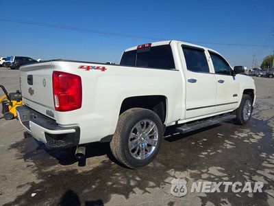 Trzecie zdjęcie samochodu z tyłu: 2016 CHEVROLET SILVERADO K1500 HIGH COUNTRY VIN:3GCUKTEC9GG278482 - miniatura