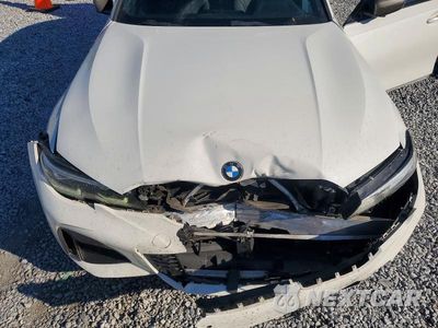 Zdjęcie 11 z 12 samochodu: 2021 BMW M340I VIN:3MW5U7J03M8B63428 - miniatura