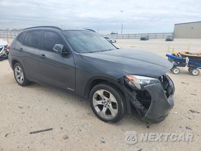 Czwarte zdjęcie samochodu z boku: 2014 BMW X1 SDRIVE28I VIN:WBAVM1C54EVW54711 - miniatura