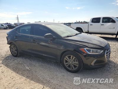 Czwarte zdjęcie samochodu z boku: 2018 HYUNDAI ELANTRA VALUE EDITION VIN:5NPD84LF6JH260781 - miniatura