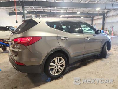 Trzecie zdjęcie samochodu z tyłu: 2013 HYUNDAI SANTA FE SPORT 2.0T VIN:5XYZWDLA1DG040489 - miniatura
