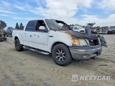 Czwarte zdjęcie samochodu z boku: 2001 FORD F150 SUPERCREW VIN:1FTRW07L71KC28069 - miniatura