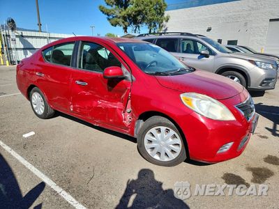 Czwarte zdjęcie samochodu z boku: 2012 NISSAN VERSA 1.6 S VIN:3N1CN7APXCL916486 - miniatura
