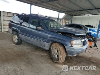 Czwarte zdjęcie samochodu z boku: 2002 JEEP GRAND CHEROKEE LAREDO VIN:1J4GW48S12C315203 - miniatura