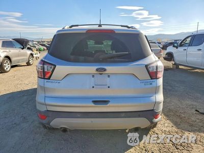 Zdjęcie 6 z 12 samochodu: 2017 FORD ESCAPE TITANIUM VIN:1FMCU9J91HUD85006 - miniatura