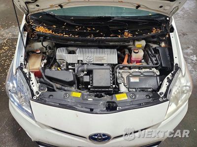 Zdjęcie 12 z 13 samochodu: 2014 TOYOTA PRIUS TWO VIN:JTDKN3DU9E1833029 - miniatura