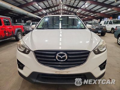 Piąte zdjęcie samochodu w środku: 2016 MAZDA CX-5 GT VIN:JM3KE4DY3G0715356 - miniatura