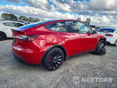 Trzecie zdjęcie samochodu z tyłu: 2022 TESLA MODEL Y VIN:7SAYGDEF4NF406216 - miniatura