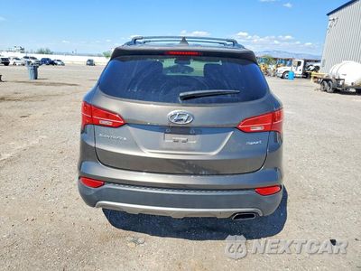 Zdjęcie 6 z 12 samochodu: 2014 HYUNDAI SANTA FE SPORT 2.4L VIN:5XYZU3LB6EG216351 - miniatura