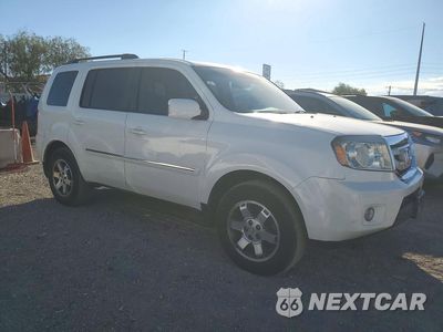 Czwarte zdjęcie samochodu z boku: 2011 HONDA PILOT TOURING VIN:5FNYF3H96BB040304 - miniatura