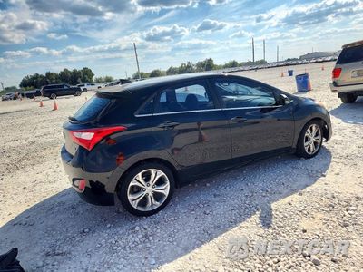 Trzecie zdjęcie samochodu z tyłu: 2013 HYUNDAI ELANTRA GT BASE VIN:KMHD35LEXDU155226 - miniatura
