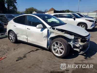 Czwarte zdjęcie samochodu z boku: 2021 TESLA MODEL Y VIN:5YJYGDEEXMF140560 - miniatura