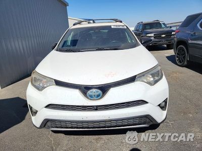 Piąte zdjęcie samochodu w środku: 2017 TOYOTA RAV4 HV SE VIN:JTMJJREV4HD075878 - miniatura