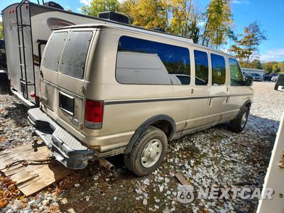 Trzecie zdjęcie samochodu z tyłu: 2010 FORD ECONOLINE E350 SUPER DUTY WAGON VIN:1FBNE3BL5ADA58037 - miniatura