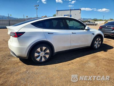 Trzecie zdjęcie samochodu z tyłu: 2023 TESLA MODEL Y VIN:7SAYGDEE1PA082990 - miniatura