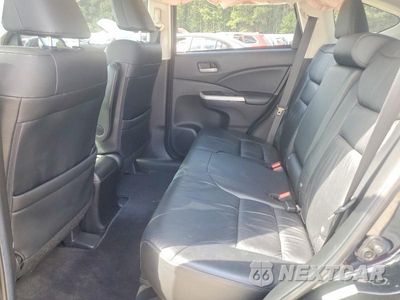 Zdjęcie 11 z 13 samochodu: 2014 HONDA CR-V EXL VIN:2HKRM3H78EH521590 - miniatura