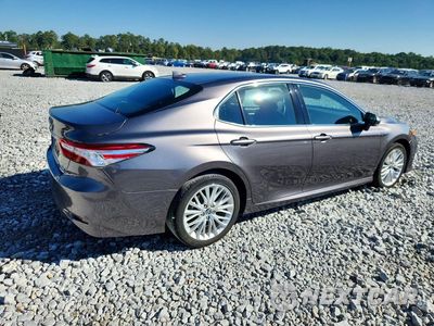 Trzecie zdjęcie samochodu z tyłu: 2019 TOYOTA CAMRY HYBRID XLE VIN:4T1B21HK6KU519169 - miniatura