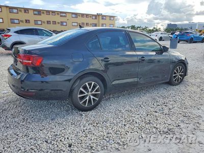 Trzecie zdjęcie samochodu z tyłu: 2016 VOLKSWAGEN JETTA SE VIN:3VWD67AJ2GM269511 - miniatura