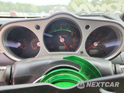 Zdjęcie 9 z 12 samochodu: 2004 NISSAN 350Z BASE VIN:JN1AZ34E14M154929 - miniatura