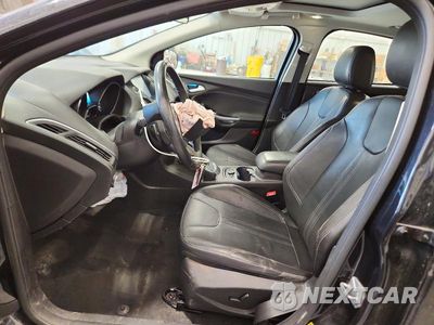 Zdjęcie 7 z 12 samochodu: 2014 FORD FOCUS TITANIUM VIN:1FADP3J22EL105181 - miniatura
