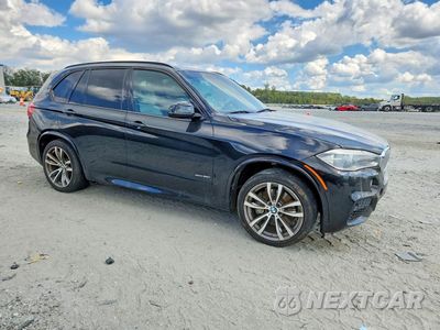 Czwarte zdjęcie samochodu z boku: 2014 BMW X5 XDRIVE50I VIN:5UXKR6C59E0C02076 - miniatura