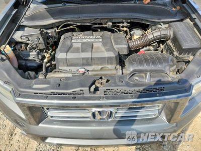 Zdjęcie 11 z 12 samochodu: 2008 HONDA RIDGELINE RT VIN:2HJYK16298H520180 - miniatura