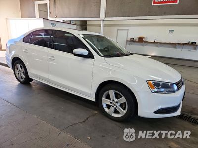 Czwarte zdjęcie samochodu z boku: 2014 VOLKSWAGEN JETTA TDI VIN:3VWLL7AJ6EM381679 - miniatura