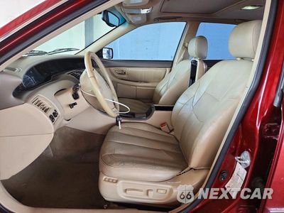 Zdjęcie 7 z 12 samochodu: 2002 TOYOTA AVALON XLS VIN:4T1BF28B82U200074 - miniatura