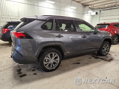 Trzecie zdjęcie samochodu z tyłu: 2023 TOYOTA RAV4 XLE PREMIUM VIN:JTMB6RFV0PD108863 - miniatura
