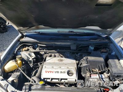 Zdjęcie 12 z 13 samochodu: 2005 TOYOTA HIGHLANDER BASE VIN:JTEEP21A650125043 - miniatura