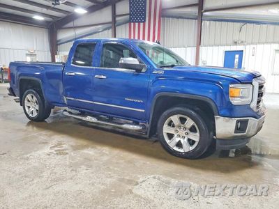 Czwarte zdjęcie samochodu z boku: 2015 GMC SIERRA K1500 SLT VIN:1GTV2VEC2FZ338259 - miniatura