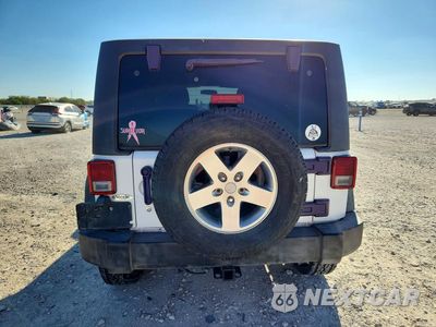 Zdjęcie 6 z 13 samochodu: 2011 JEEP WRANGLER UNLIMITED RUBICON VIN:1J4BA6H13BL584489 - miniatura