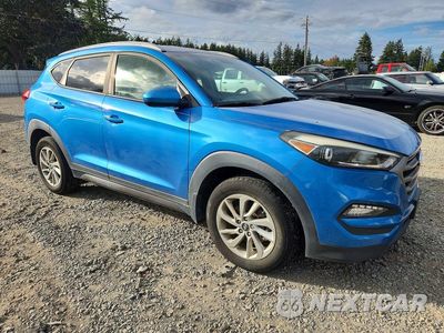 Czwarte zdjęcie samochodu z boku: 2016 HYUNDAI TUCSON SE VIN:KM8J33A4XGU198471 - miniatura