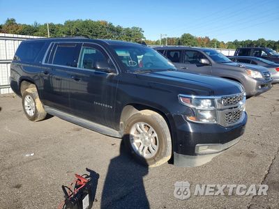 Czwarte zdjęcie samochodu z boku: 2020 CHEVROLET SUBURBAN K1500 LT VIN:1GNSKHKC2LR121757 - miniatura