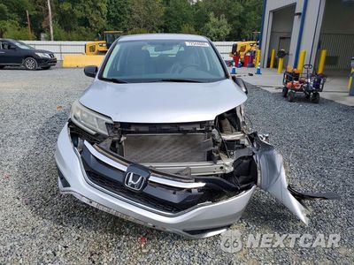 Piąte zdjęcie samochodu w środku: 2015 HONDA CR-V LX VIN:2HKRM4H39FH700516 - miniatura