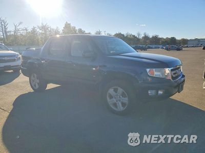 Czwarte zdjęcie samochodu z boku: 2010 HONDA RIDGELINE RTL VIN:5FPYK1F54AB001734 - miniatura