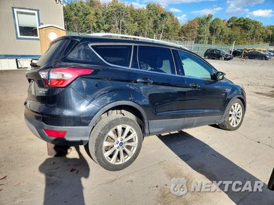 Trzecie zdjęcie samochodu z tyłu: 2017 FORD ESCAPE TITANIUM VIN:1FMCU9JDXHUC42303 - miniatura