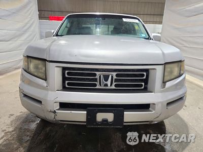 Piąte zdjęcie samochodu w środku: 2006 HONDA RIDGELINE RTL VIN:2HJYK16526H554856 - miniatura
