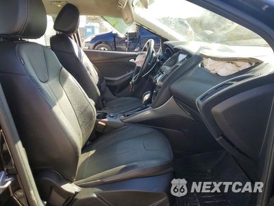 Zdjęcie 7 z 12 samochodu: 2014 FORD FOCUS TITANIUM VIN:1FADP3N29EL192684 - miniatura