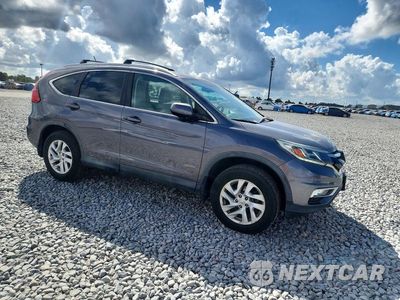 Czwarte zdjęcie samochodu z boku: 2015 HONDA CR-V EXL VIN:2HKRM4H74FH608913 - miniatura
