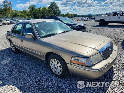 Czwarte zdjęcie samochodu z boku: 2004 MERCURY GRAND MARQUIS GS VIN:2MEFM74W34X657886 - miniatura