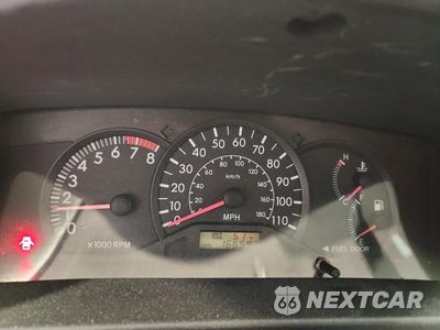 Zdjęcie 9 z 12 samochodu: 2003 TOYOTA COROLLA CE VIN:JTDBR32EX32014618 - miniatura