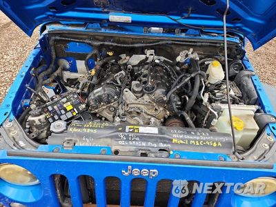 Zdjęcie 11 z 13 samochodu: 2015 JEEP WRANGLER UNLIMITED SPORT VIN:1C4BJWDG3FL729830 - miniatura