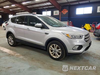 Czwarte zdjęcie samochodu z boku: 2017 FORD ESCAPE SE VIN:1FMCU9G96HUE27824 - miniatura