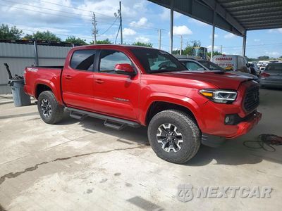 Czwarte zdjęcie samochodu z boku: 2023 TOYOTA TACOMA TRD OFF-ROAD VIN:3TMCZ5AN5PM589676 - miniatura
